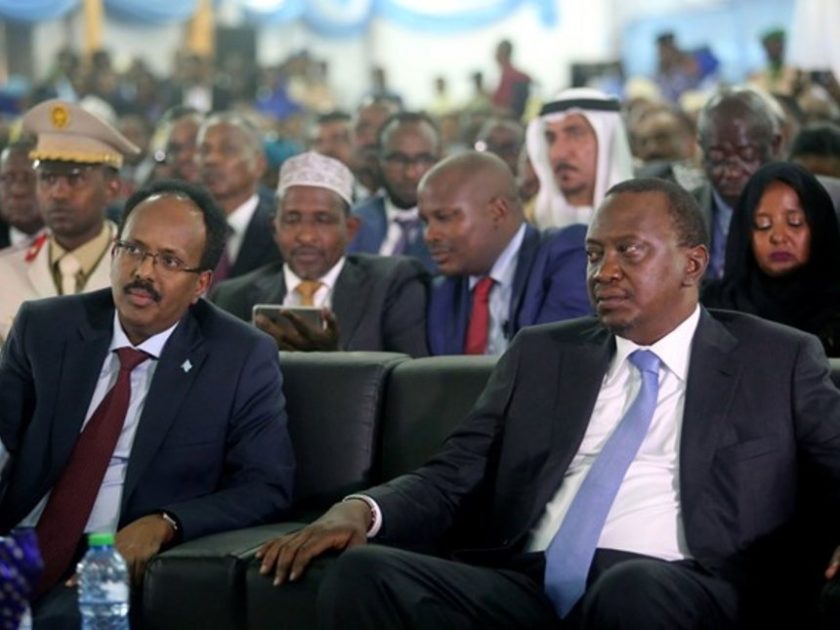 Somalia Head of State, Mohamed Abdullahi Mohamed, and his Kenyan Counterpart, Uhuru Kenyatta, at a past international event. Kenya has declared her northern neighbour, Somalia, an enemy state for allegedly auctioning oil and gas blocks falling within the Kenyan maritime territory near its border early this month.