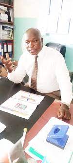 Mr. Clement Nyang’acha, Principal,