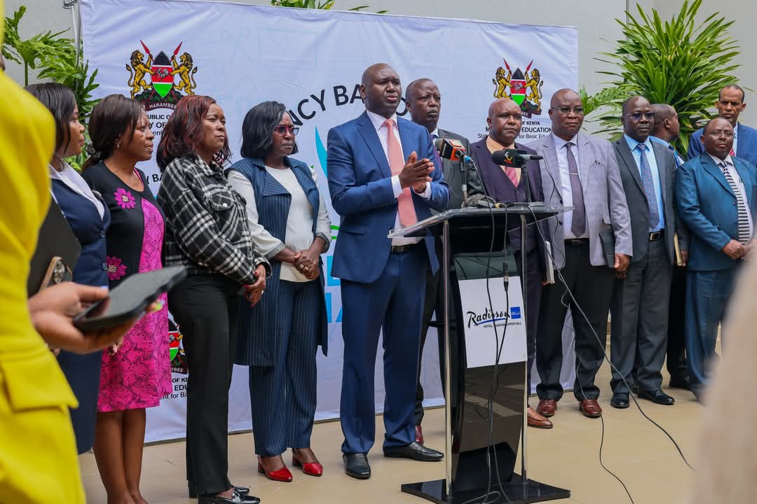 PS Basic Education Prof. Julius Bitok (Centre) when he unveiled the multi-agency team tasked with consolidating existing registers for all students on May 15, 2025.